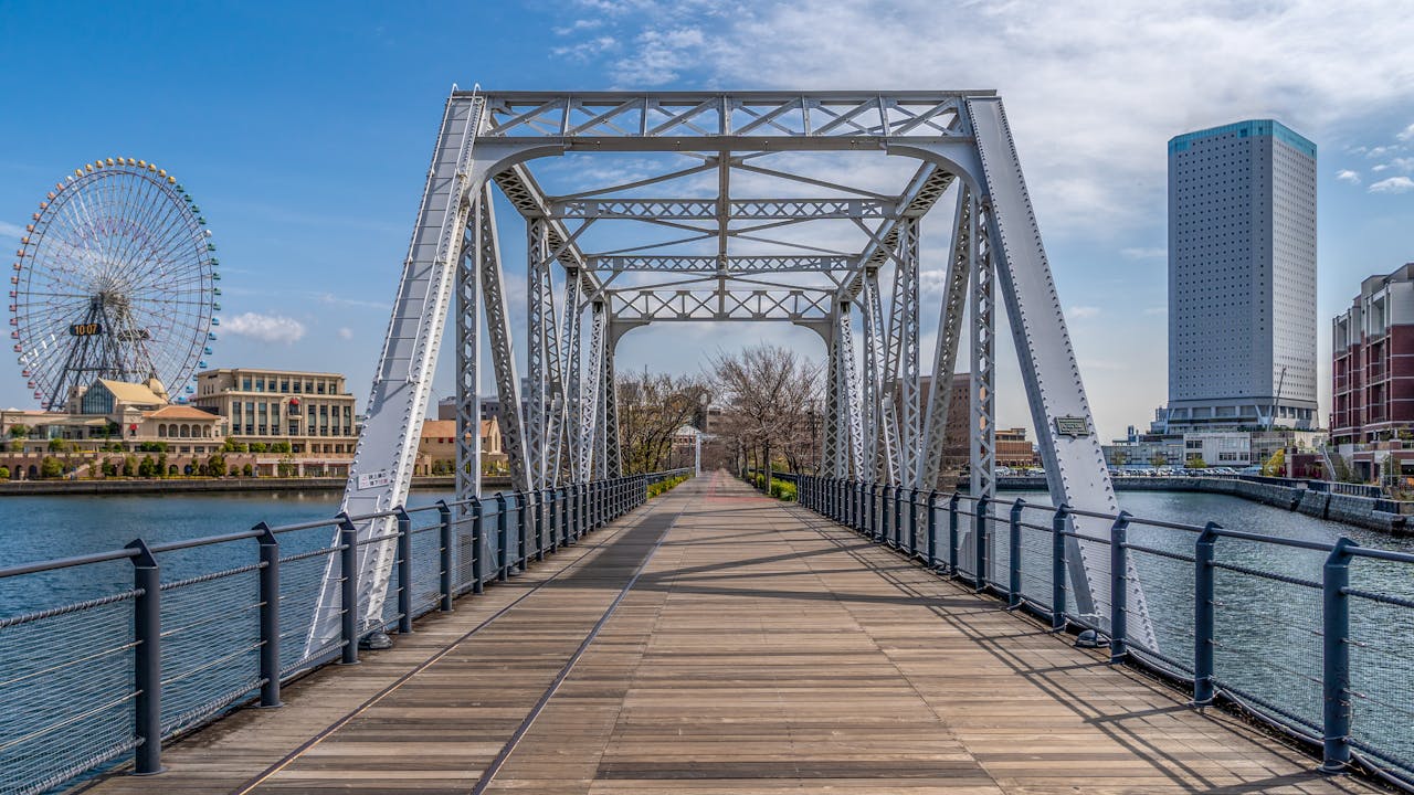 Bridge over the water – likely daytime, historical vibe Historic waterfront bridge in Yokohama, featured on a Yokohama private walking tour during the day, offering local history and scenic views.